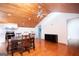 Open-concept kitchen and dining room with full-sized appliances, laundry and wood accents at 1502 Campground, Mcdonough, GA 30252