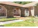 Brick arches and brick pathway lead to the front entrance of this home at 1502 Campground, Mcdonough, GA 30252