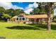 Spacious exterior with brick siding, covered back porch, and ample yard space at 1502 Campground, Mcdonough, GA 30252