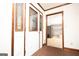 Inviting foyer with leaded-glass windows, brick floors, and views of the kitchen at 1502 Campground, Mcdonough, GA 30252