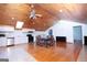 Spacious kitchen with light cabinets, stainless appliances, and hardwood floors at 1502 Campground, Mcdonough, GA 30252