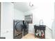 Well lit laundry room with washer, dryer, and utility sink at 1502 Campground, Mcdonough, GA 30252