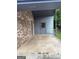 Spacious carport with gray trim that connects to a storage area in the back at 266 Ridge Trl, Riverdale, GA 30274