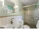 Bathroom featuring retro tiles, a standing shower, and functional fixtures, maintaining vintage charm at 2826 Summit Ridge Dr, Marietta, GA 30066