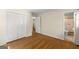 Comfortable bedroom featuring hardwood floors, closet space, and access to an ensuite bathroom at 2826 Summit Ridge Dr, Marietta, GA 30066
