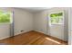 Bright bedroom with hardwood floors and windows, offering a simple and serene retreat at 2826 Summit Ridge Dr, Marietta, GA 30066