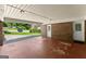 Spacious carport with brick wall and view of the driveway at 2826 Summit Ridge Dr, Marietta, GA 30066