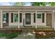Inviting front porch with classic columns and a welcoming entrance, perfect for relaxing at 2826 Summit Ridge Dr, Marietta, GA 30066