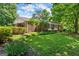 Charming home with well-manicured lawn and lush greenery at 2826 Summit Ridge Dr, Marietta, GA 30066
