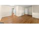 A well-lit living room features hardwood floors and neutral paint, creating a bright and welcoming space at 2826 Summit Ridge Dr, Marietta, GA 30066