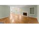 Spacious living room with hardwood floors and a classic fireplace, ideal for gatherings at 2826 Summit Ridge Dr, Marietta, GA 30066