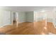 Open living area showcasing beautiful hardwood floors and seamless transitions between rooms at 2826 Summit Ridge Dr, Marietta, GA 30066