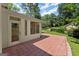 Patio area featuring brick pavers, sunroom access, and lawn area at 2826 Summit Ridge Dr, Marietta, GA 30066