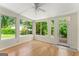 Bright sunroom with large windows providing ample natural light and views of the surrounding landscape at 2826 Summit Ridge Dr, Marietta, GA 30066