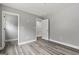 Bright bedroom features wood-style flooring and neutral paint at 5341 Stewart Mill Rd, Douglasville, GA 30135