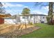 The backyard features a well-maintained lawn and an area covered with mulch at 1092 Donnelly Sw Ave, Atlanta, GA 30310