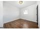 Bright bedroom with hardwood floors, crown molding, and a natural light window at 1092 Donnelly Sw Ave, Atlanta, GA 30310