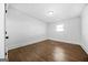 Bedroom with hardwood floors, neutral walls, and natural light at 1092 Donnelly Sw Ave, Atlanta, GA 30310
