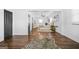 View of Primary bedroom showing hardwood floors, neutral decor, and ensuite access at 1092 Donnelly Sw Ave, Atlanta, GA 30310