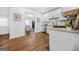 Bright kitchen featuring white cabinets, granite countertops, stainless steel appliances and hardwood floors at 1092 Donnelly Sw Ave, Atlanta, GA 30310
