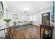 Bright living room featuring hardwood floors, stylish decor, and ample natural light at 1092 Donnelly Sw Ave, Atlanta, GA 30310