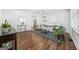 Bright living room featuring hardwood floors, stylish decor, and ample natural light at 1092 Donnelly Sw Ave, Atlanta, GA 30310