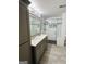 Modern bathroom with double sinks and a luxurious walk-in shower at 2410 Thrasher Rd, Buford, GA 30519