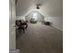 Spacious bonus room with seating and natural light at 25 Castlehill Ct, Covington, GA 30016