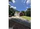 This home's exterior features beautiful landscaping, grass and a well-maintained driveway at 25 Castlehill Ct, Covington, GA 30016