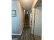 Hallway with stairs to upper level at 25 Castlehill Ct, Covington, GA 30016
