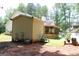 Back of property, showcasing the shed at 25 Castlehill Ct, Covington, GA 30016