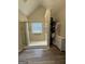 Walk-in shower with glass block window, storage cabinet and neutral tones at 25 Castlehill Ct, Covington, GA 30016