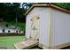 Exterior view of the storage shed and ramp at 25 Castlehill Ct, Covington, GA 30016