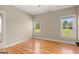 Spacious bedroom with hardwood floors and abundant natural light at 411 Hickory Fairway Ct, Woodstock, GA 30188