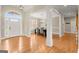 Welcoming foyer with hardwood floors leading to a dining room at 411 Hickory Fairway Ct, Woodstock, GA 30188