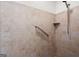 Accessible shower with tiled walls, shower head and safety grab bar at 411 Hickory Fairway Ct, Woodstock, GA 30188