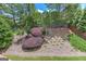 Backyard showing the landscaping with different bushes, mulch, and green grass at 4924 Locklear Way, Marietta, GA 30066
