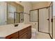 Bright bathroom with dual sinks, granite countertops, and a glass shower at 4924 Locklear Way, Marietta, GA 30066