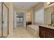 Open Primary bath with dual sinks, a soaking tub, and walk-in shower at 4924 Locklear Way, Marietta, GA 30066