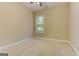 Neutral bedroom with carpet, ceiling fan, and a window with blinds at 4924 Locklear Way, Marietta, GA 30066
