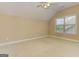 Bright bedroom featuring neutral walls, trim, and carpet at 4924 Locklear Way, Marietta, GA 30066