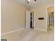 Bright bedroom with carpet and an open door leading to the bathroom at 4924 Locklear Way, Marietta, GA 30066
