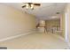 Spacious bonus room with plush carpeting and staircase at 4924 Locklear Way, Marietta, GA 30066
