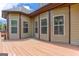 Home back deck with exterior showing wood siding and many windows at 4924 Locklear Way, Marietta, GA 30066