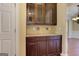 Butler's pantry with custom cabinets, tile backsplash, and granite countertops at 4924 Locklear Way, Marietta, GA 30066