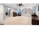 Large basement area with a fireplace, built-in cabinets, and comfortable seating at 5418 Amity Dr, Powder Springs, GA 30127