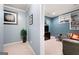 Finished basement with a comfortable seating area, built-in shelving, and soft lighting at 5418 Amity Dr, Powder Springs, GA 30127