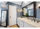 Elegant bathroom featuring double sinks, stylish fixtures, and modern decor at 5418 Amity Dr, Powder Springs, GA 30127