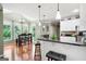 Bright kitchen with stainless steel appliances, granite countertops, and a breakfast bar with seating at 5418 Amity Dr, Powder Springs, GA 30127