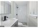 Updated bathroom featuring a large vanity, modern fixtures, and tiled shower at 2106 Singer Way, Lithonia, GA 30058